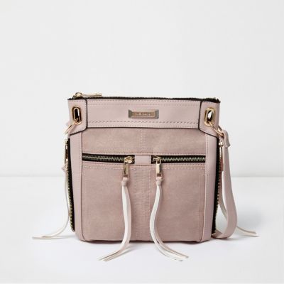 Light pink zip front mini messenger bag